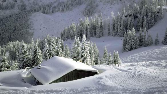 snowed_in_cabin_in_the_mountains